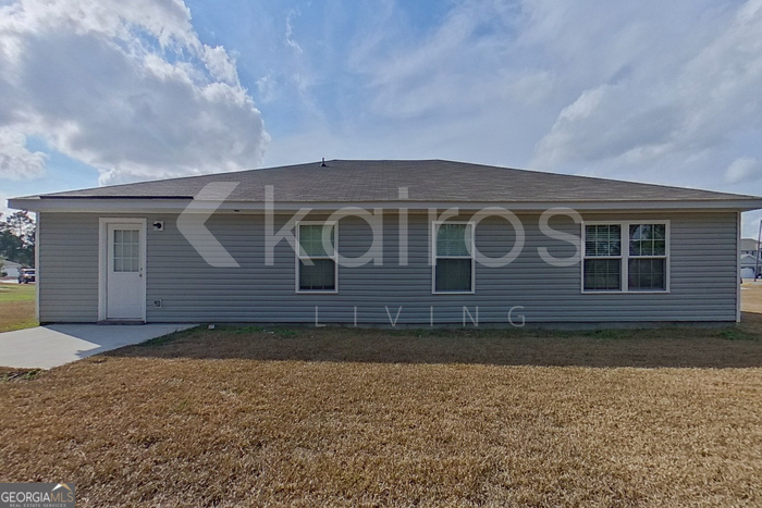 110 Western Red Cedar Drive Springfield, GA 31329 - Photo 17 of 19 a house view with a backyard space