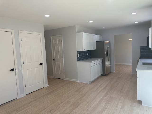 1311 Blue Ridge Parkway Algonquin, IL 60102 - Photo 9 of 21 a kitchen with granite countertop a sink and a stove top oven