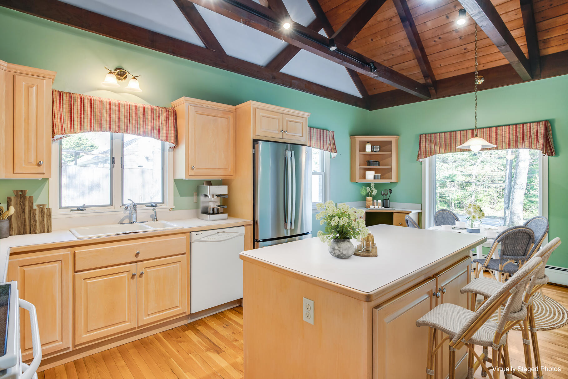 1118 Bumps River Road Centerville, MA 02632 - Photo 4 of 20 a kitchen with a stove a sink and a refrigerator