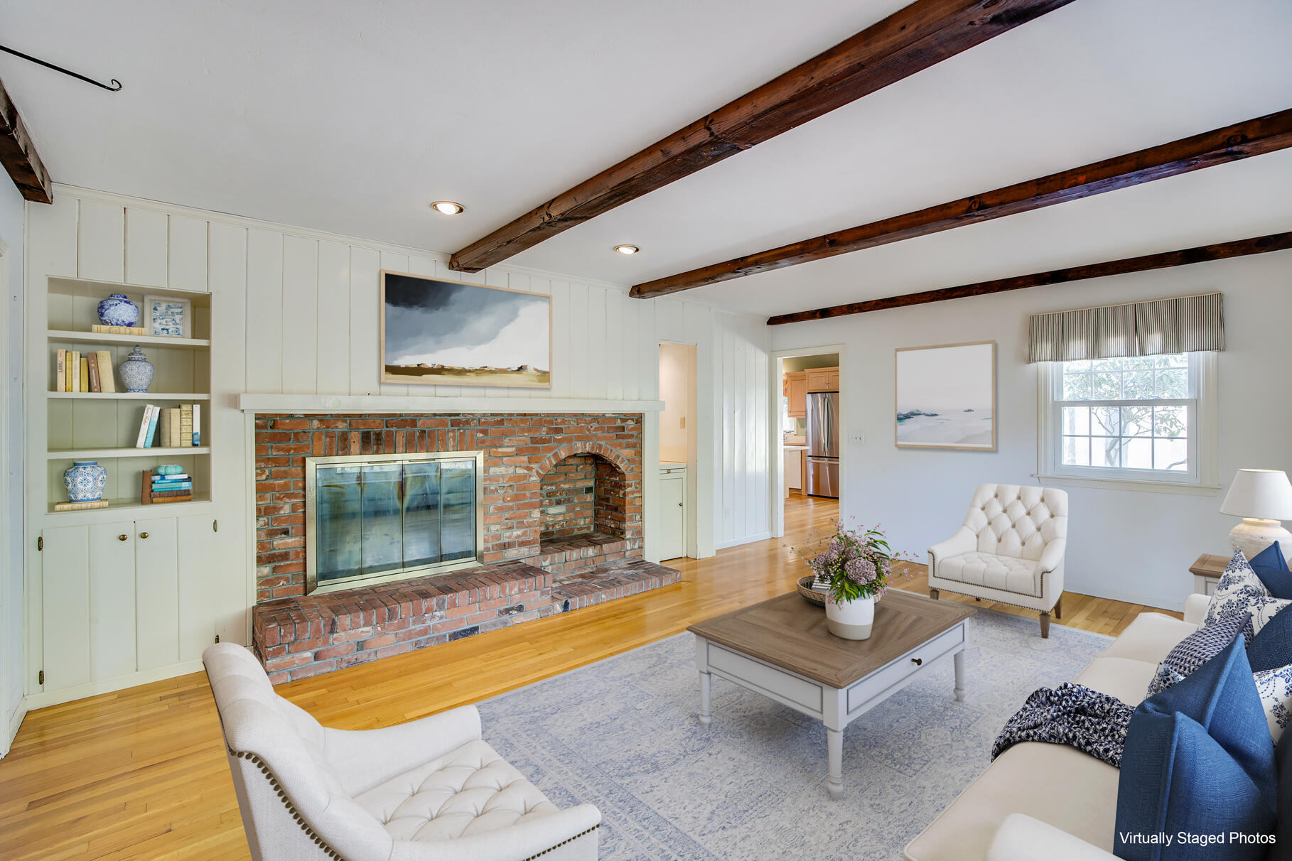 1118 Bumps River Road Centerville, MA 02632 - Photo 5 of 20 a living room with furniture and a fireplace