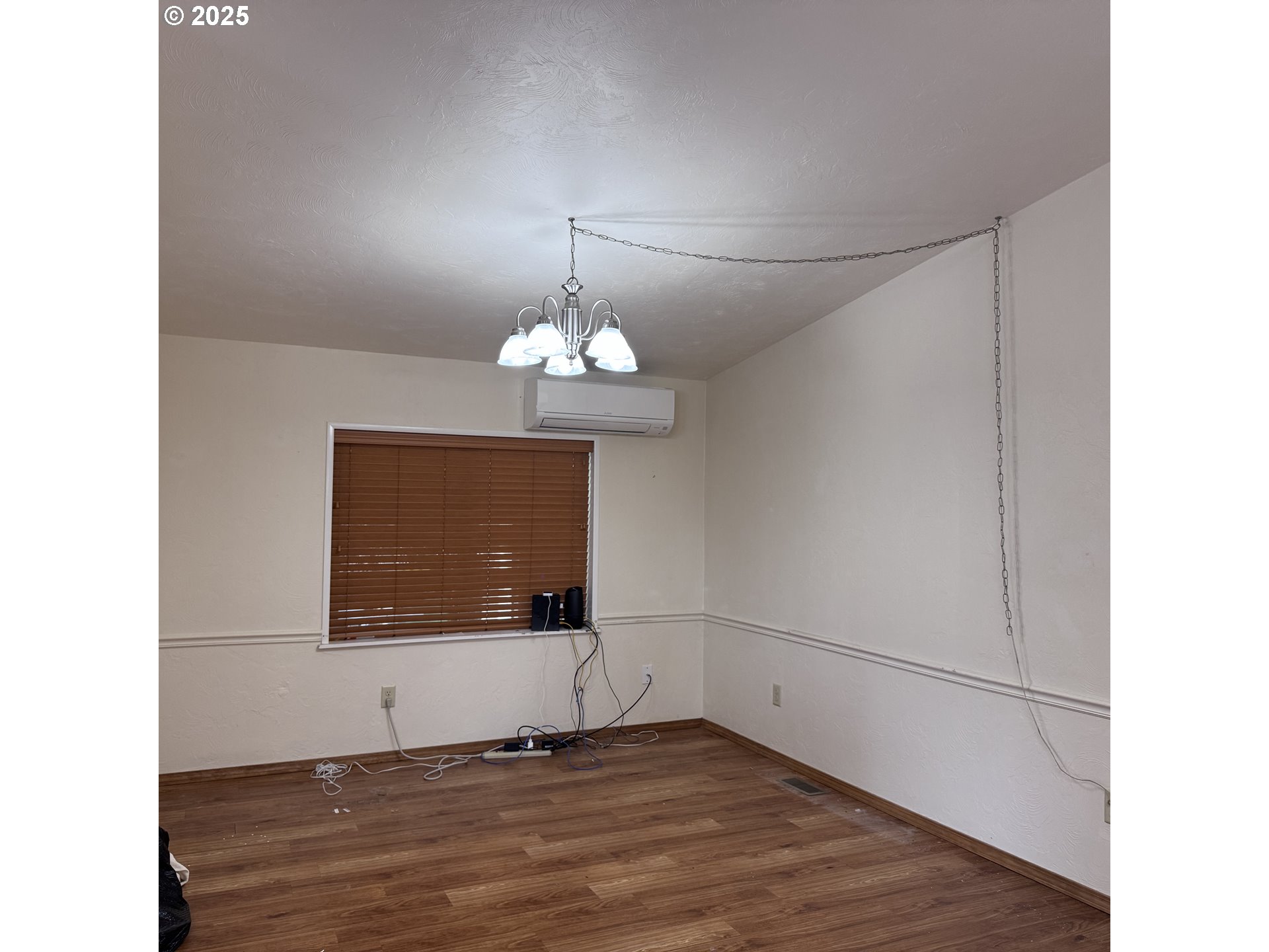 1601 Rhododendron Drive, Unit 695 Florence, OR 97439 - Photo 29 of 42 a view of an empty room with a window