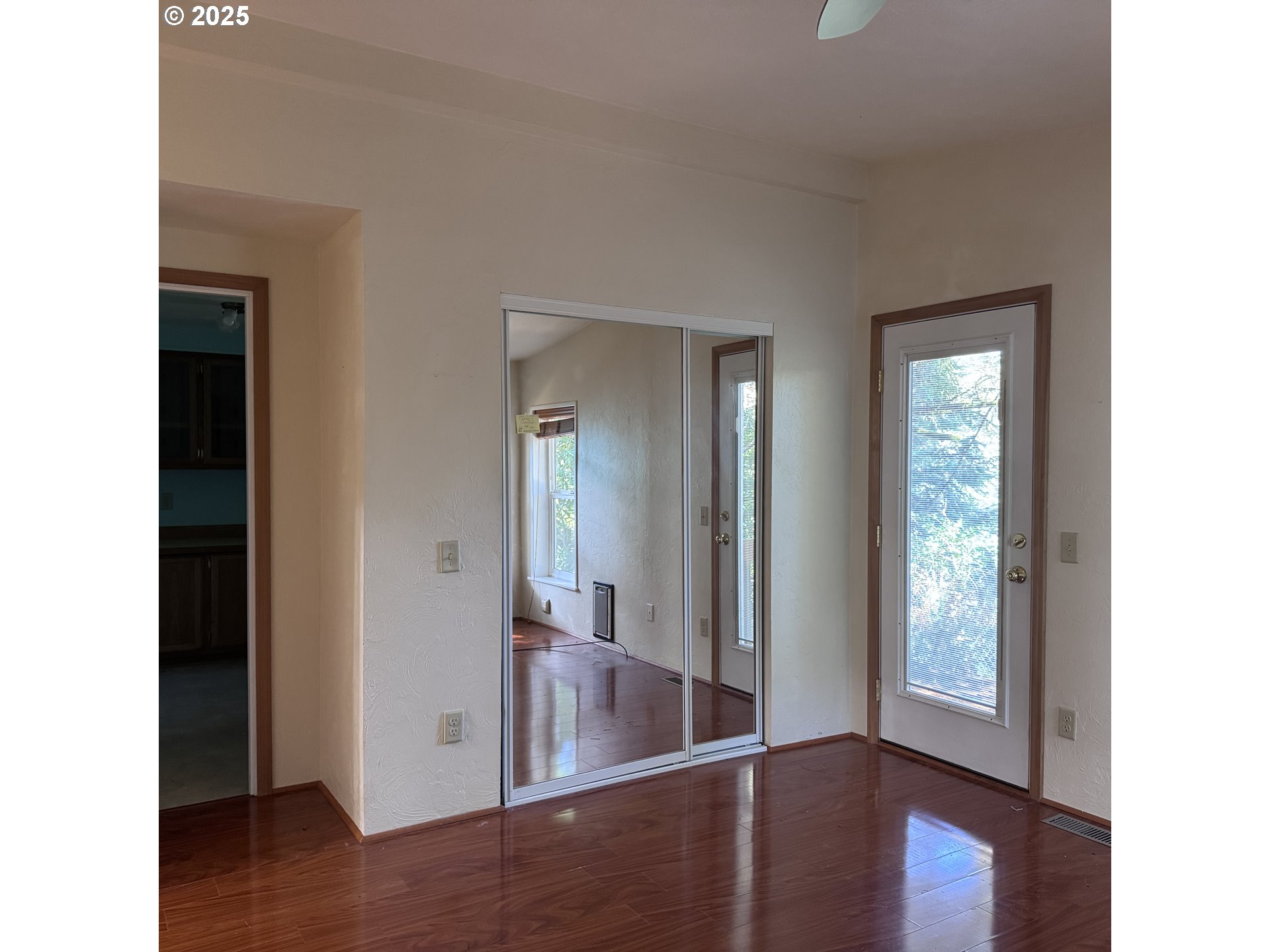 1601 Rhododendron Drive, Unit 695 Florence, OR 97439 - Photo 32 of 42 a view of a hallway with wooden floor and stairs