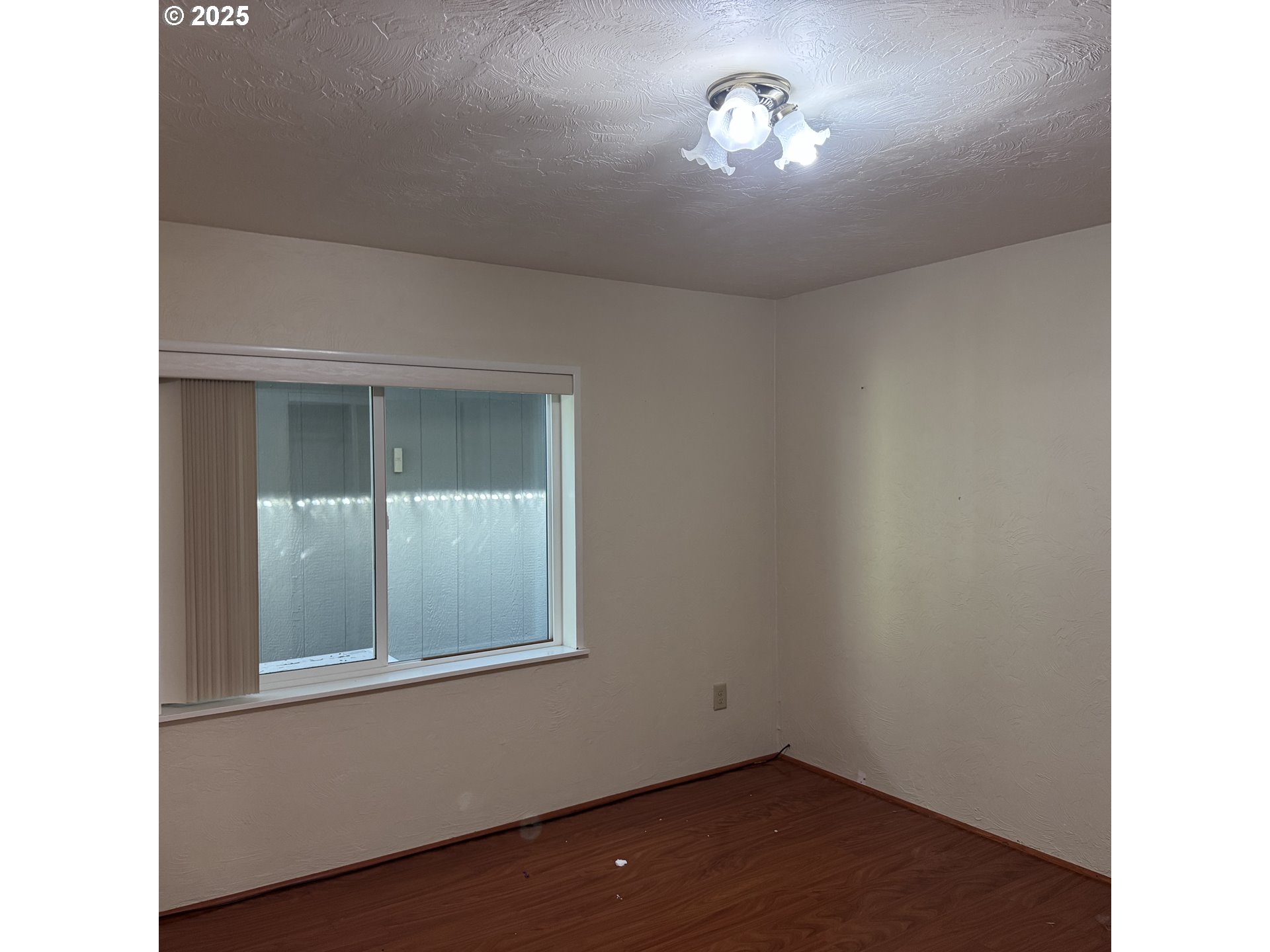 1601 Rhododendron Drive, Unit 695 Florence, OR 97439 - Photo 40 of 42 a view of empty room with window