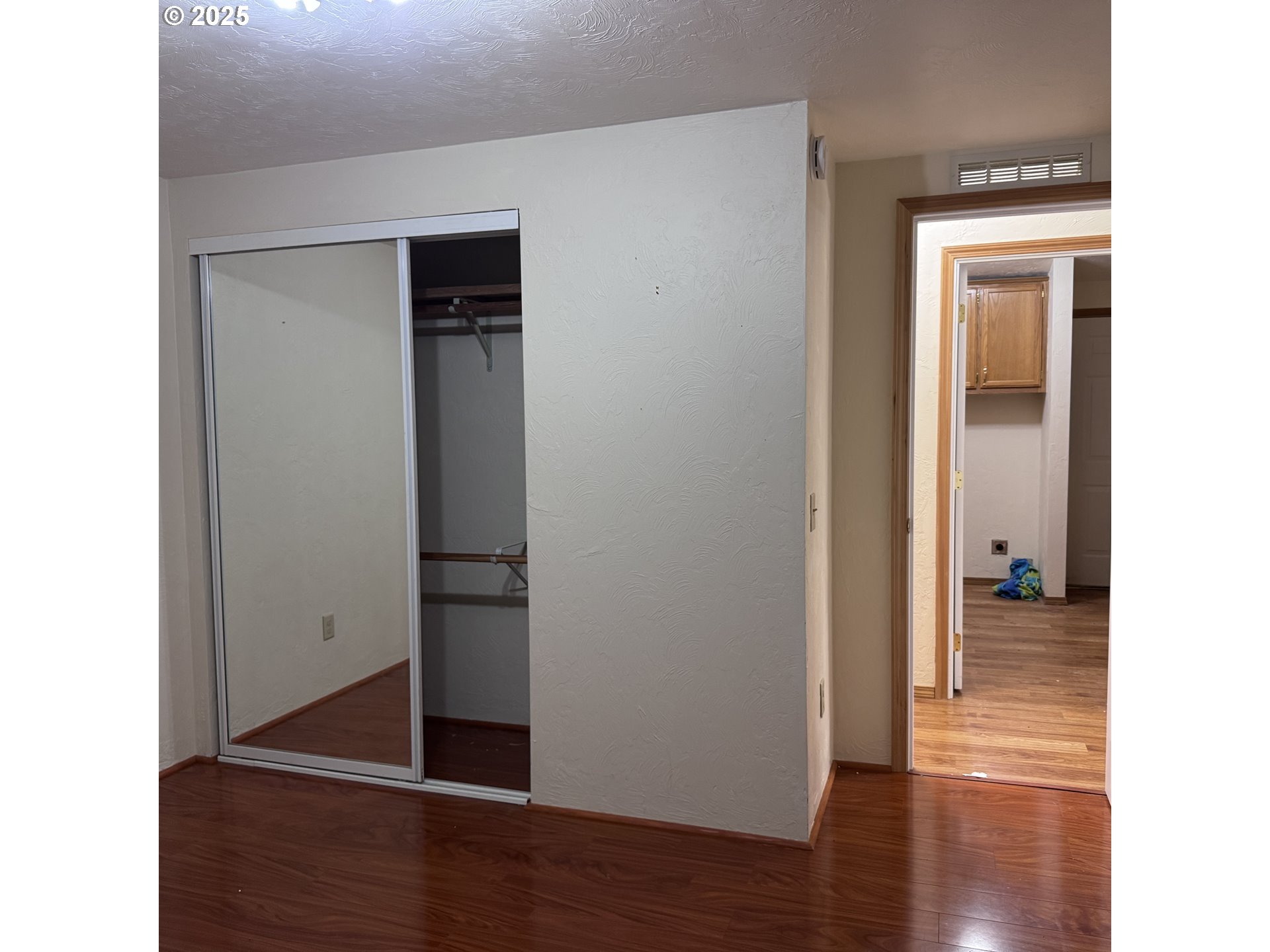 1601 Rhododendron Drive, Unit 695 Florence, OR 97439 - Photo 41 of 42 a view of a hallway with wooden floor