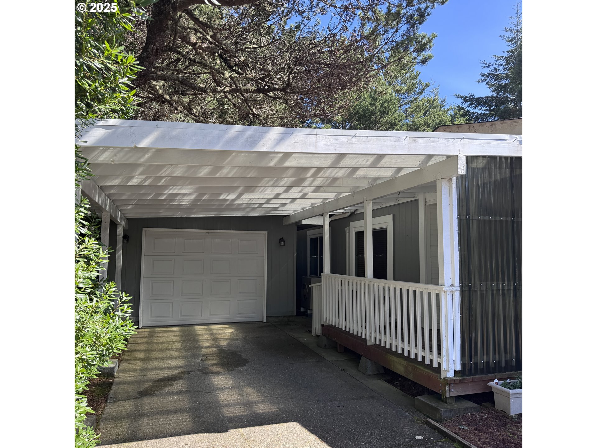 1601 Rhododendron Drive, Unit 695 Florence, OR 97439 - Photo 5 of 42 a view of a porch