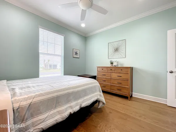 a bathroom with a granite countertop sink a toilet and a bathtub