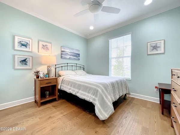 a room with a bed and furniture