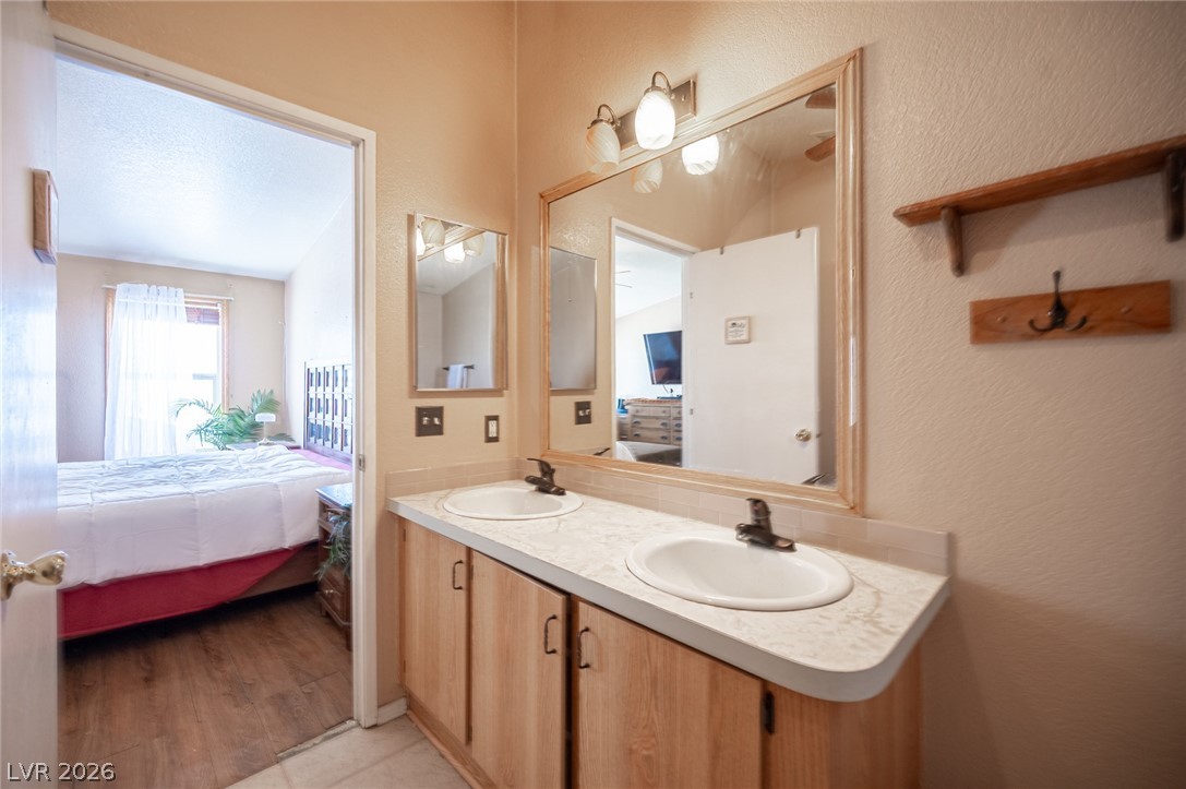 3200 Maple Road Pahrump, NV 89048 - Photo 39 of 53 Double vanity in this bathroom provides convenience and practicality.
