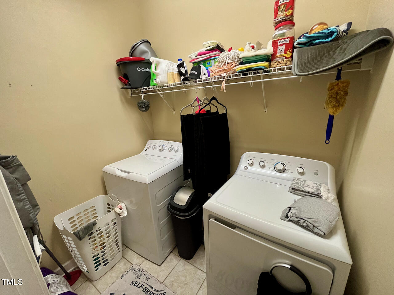 159 Geranium Way Clayton, NC 27527 - Photo 14 of 29 a utility room with dryer and washer