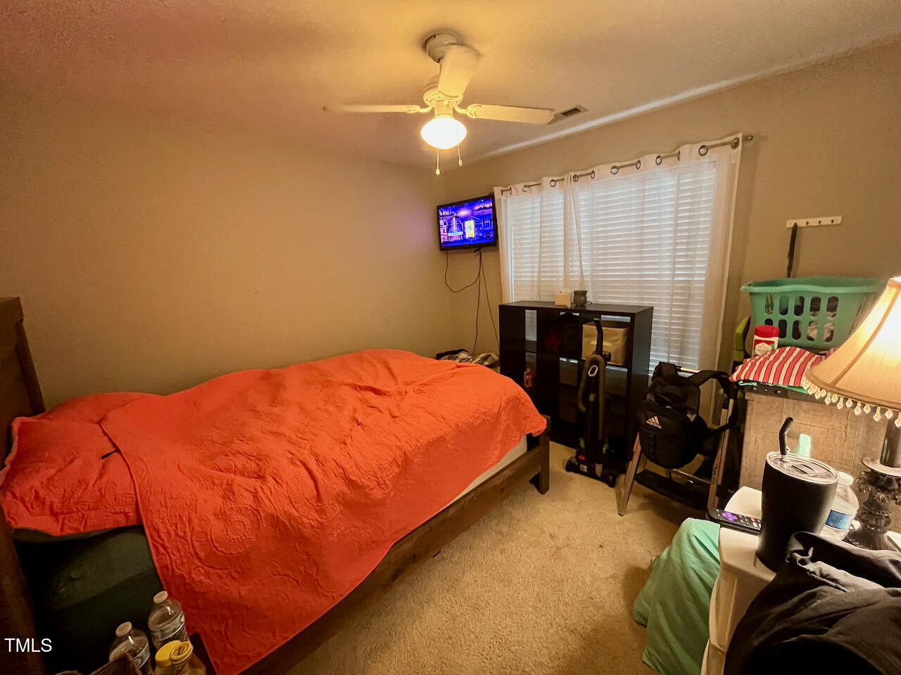 159 Geranium Way Clayton, NC 27527 - Photo 20 of 29 a bed room with a bed and a chair