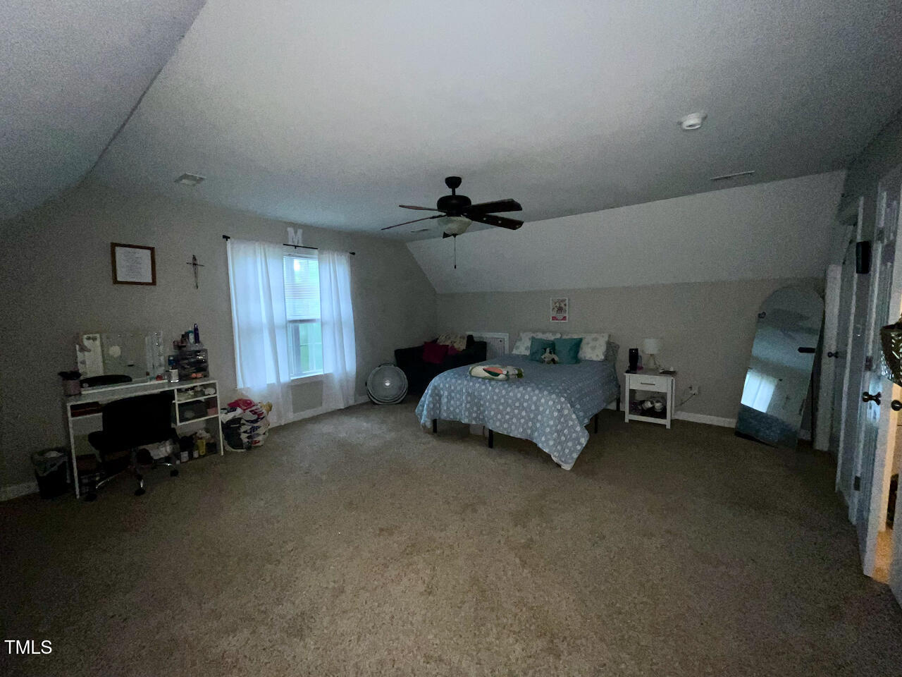 159 Geranium Way Clayton, NC 27527 - Photo 23 of 29 a bed room with furniture and a window