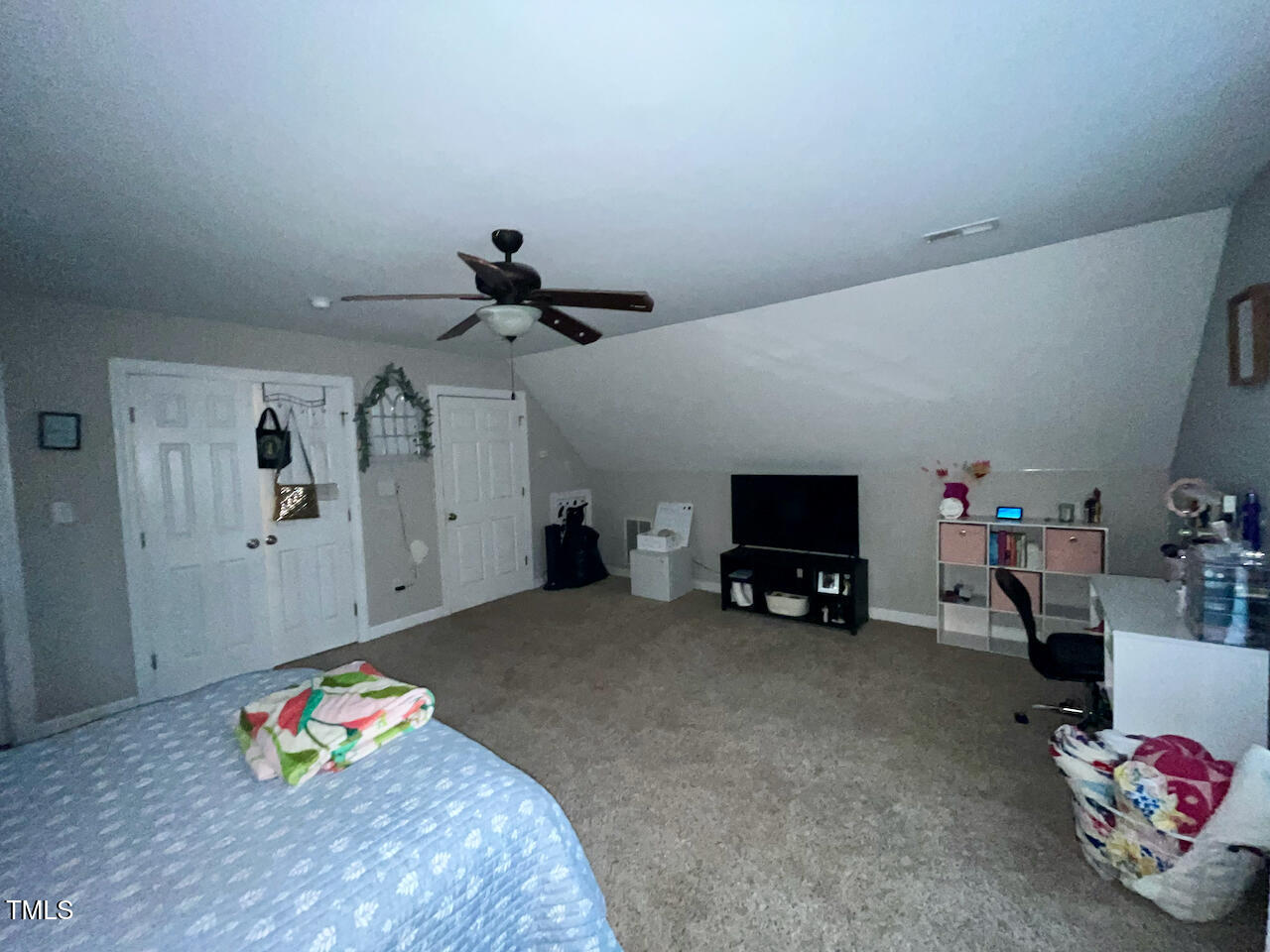 159 Geranium Way Clayton, NC 27527 - Photo 24 of 29 a living room with furniture and a flat screen tv