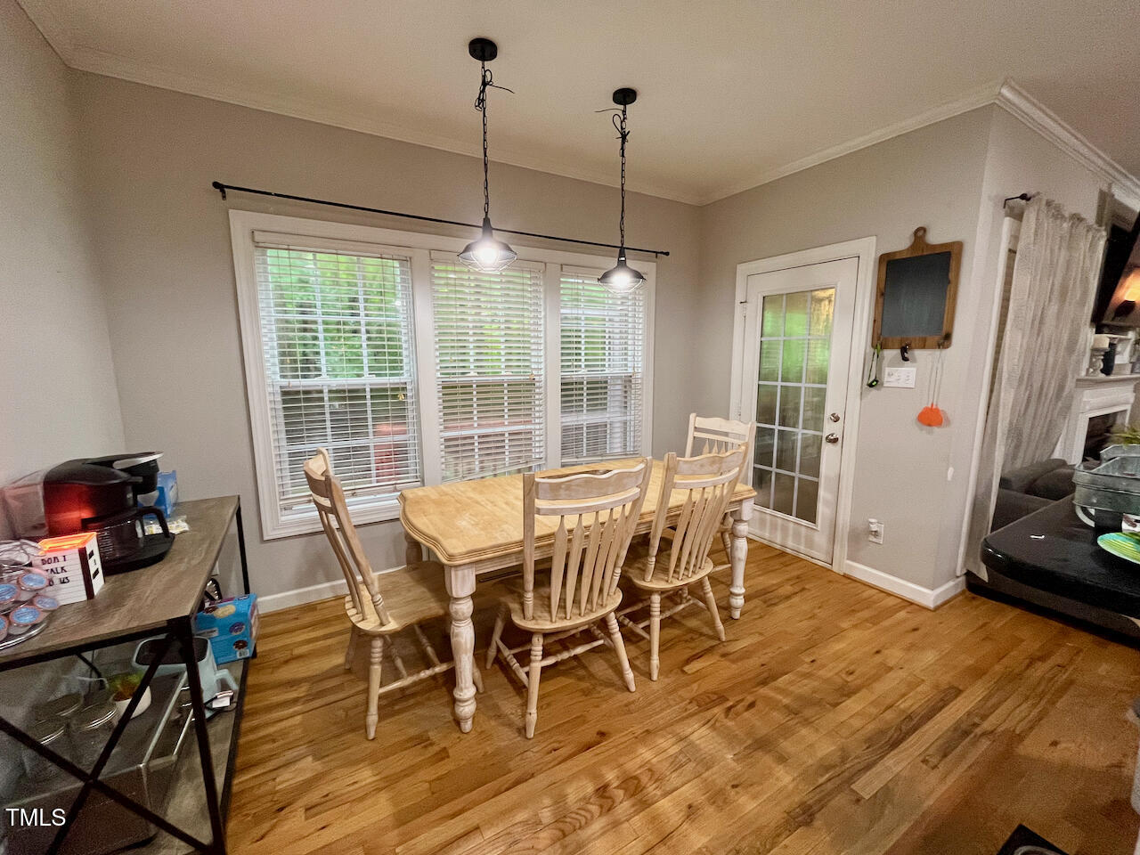 159 Geranium Way Clayton, NC 27527 - Photo 7 of 29 a view of a dining room with furniture window and outside view