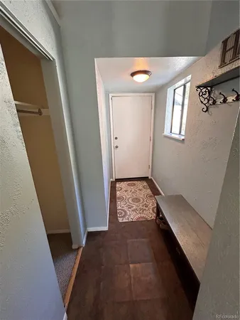 a view of balcony with furniture