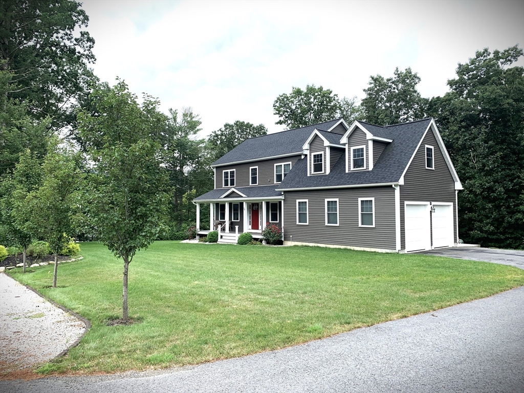 39 Davidson Road Charlton, MA 01507 - Photo 1 of 42 a front view of a house with a yard