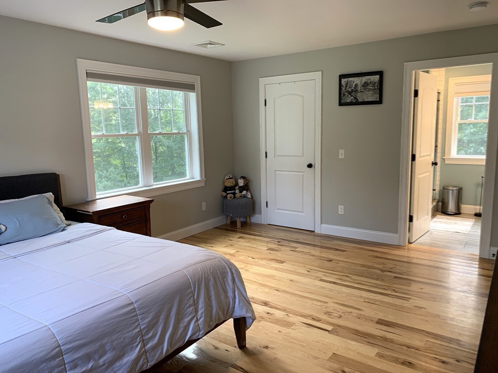 39 Davidson Road Charlton, MA 01507 - Photo 18 of 42 a bedroom with a bed and a window