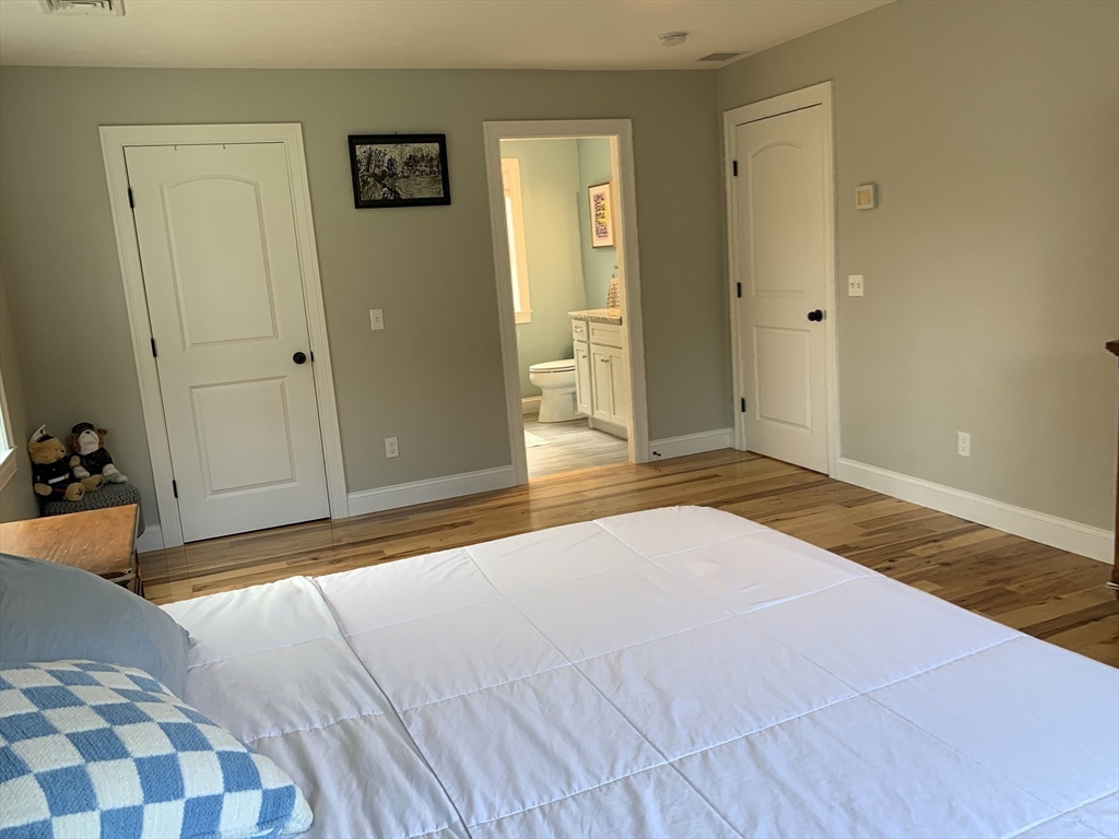 39 Davidson Road Charlton, MA 01507 - Photo 19 of 42 a bedroom with a bed and a dresser