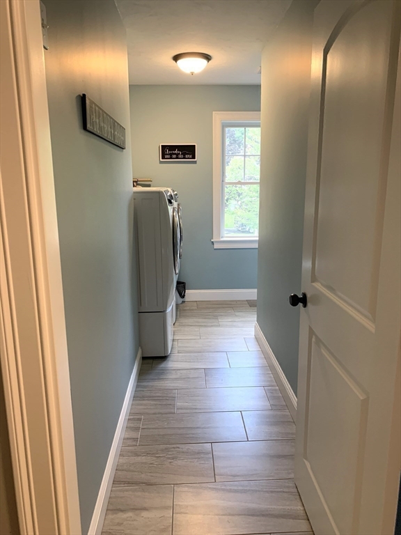 39 Davidson Road Charlton, MA 01507 - Photo 28 of 42 a view of a hallway with wooden floor