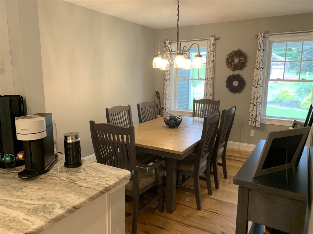 39 Davidson Road Charlton, MA 01507 - Photo 5 of 42 a view of a dining room with furniture window and wooden floor