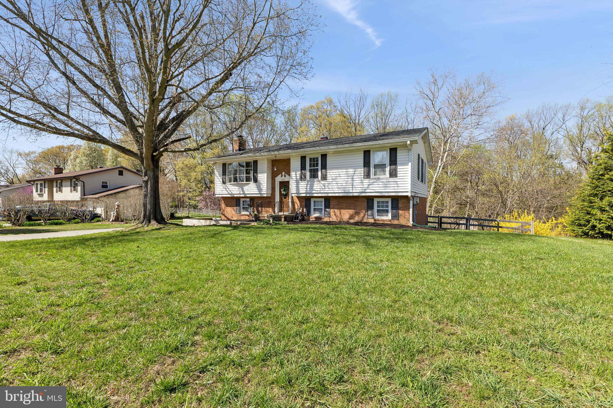 7461 Robin Road La Plata, MD 20646 - Photo 2 of 30 a view of a house with a big yard next to a big yard