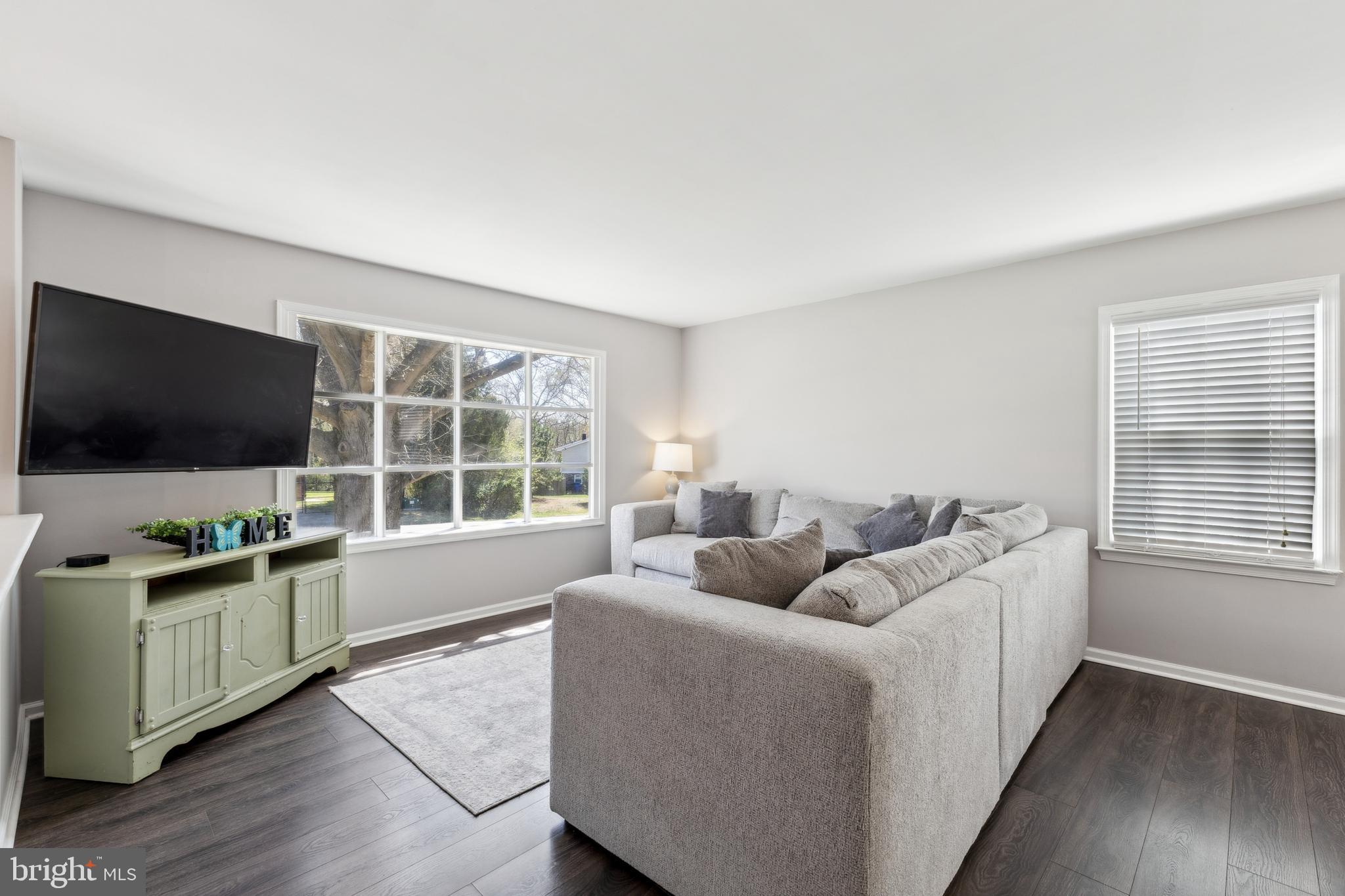 7461 Robin Road La Plata, MD 20646 - Photo 4 of 30 a living room with furniture and a flat screen tv