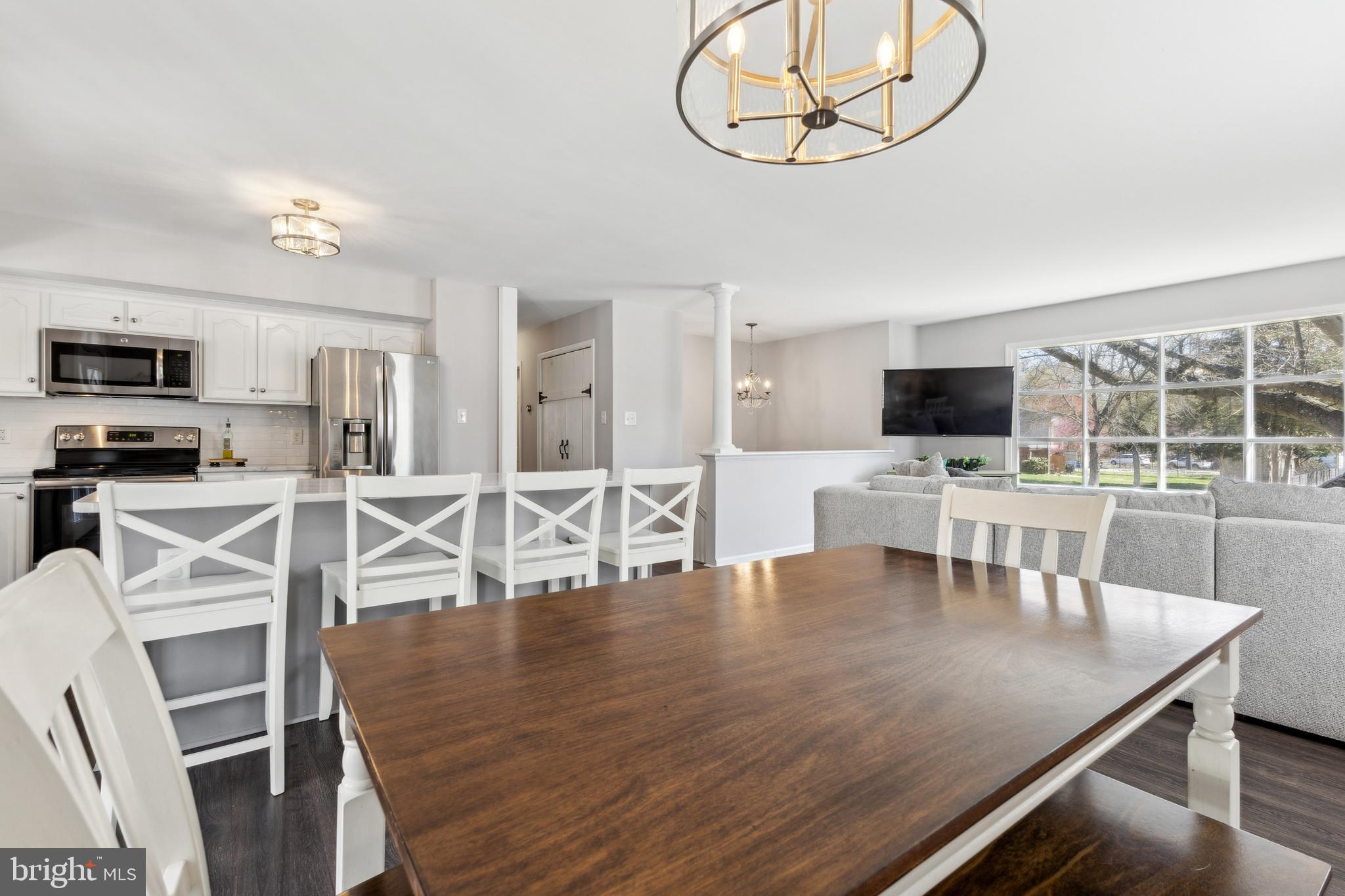 7461 Robin Road La Plata, MD 20646 - Photo 7 of 30 a view of kitchen and dining room with wooden floor