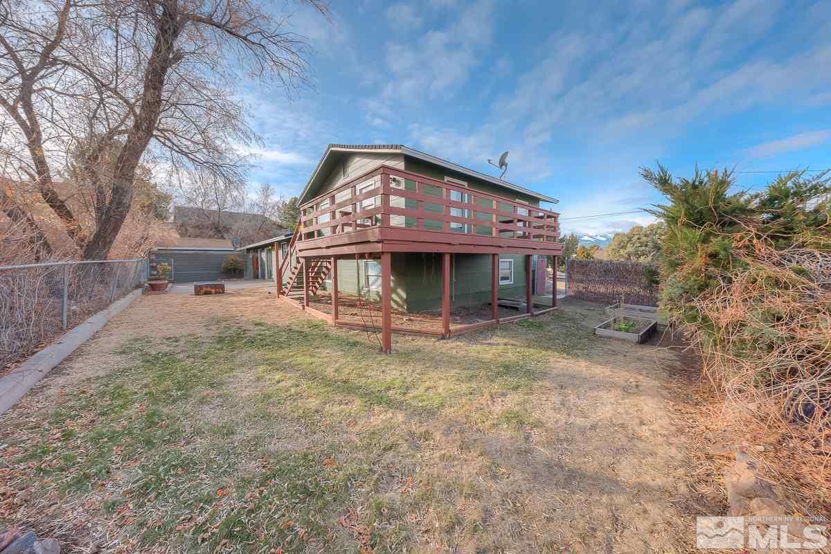 13830 Virginia Foothills Drive Reno, NV 89521 - Photo 23 of 25 a view of a house with a yard