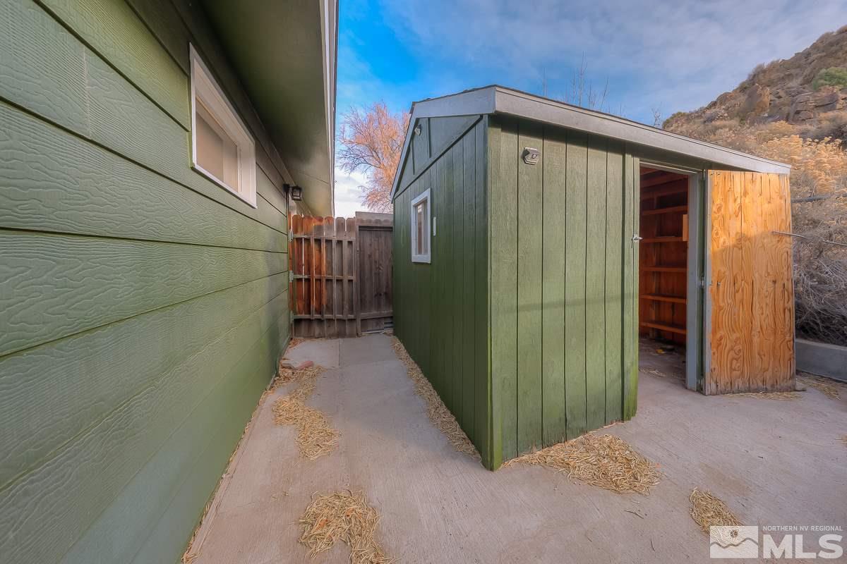 13830 Virginia Foothills Drive Reno, NV 89521 - Photo 24 of 25 a view of a house with a backyard