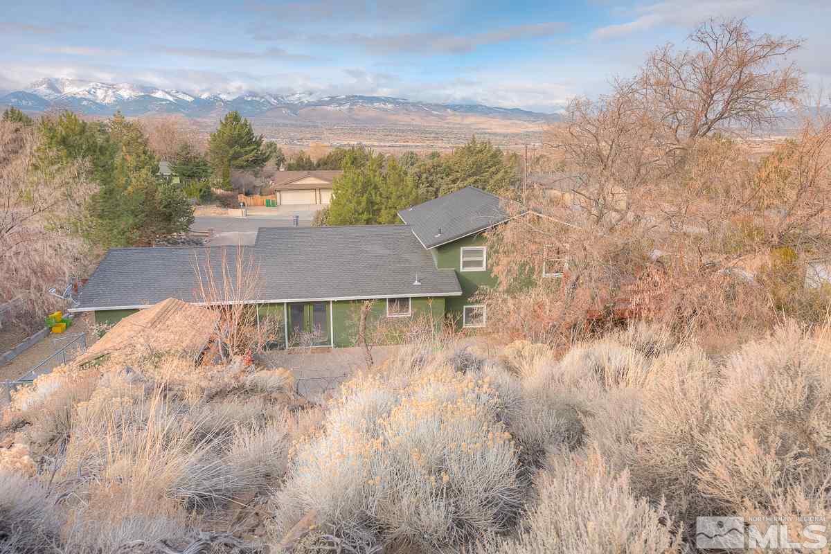 13830 Virginia Foothills Drive Reno, NV 89521 - Photo 25 of 25 a view of a house with a yard