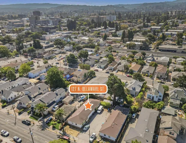 an aerial view of a city with lots of residential buildings