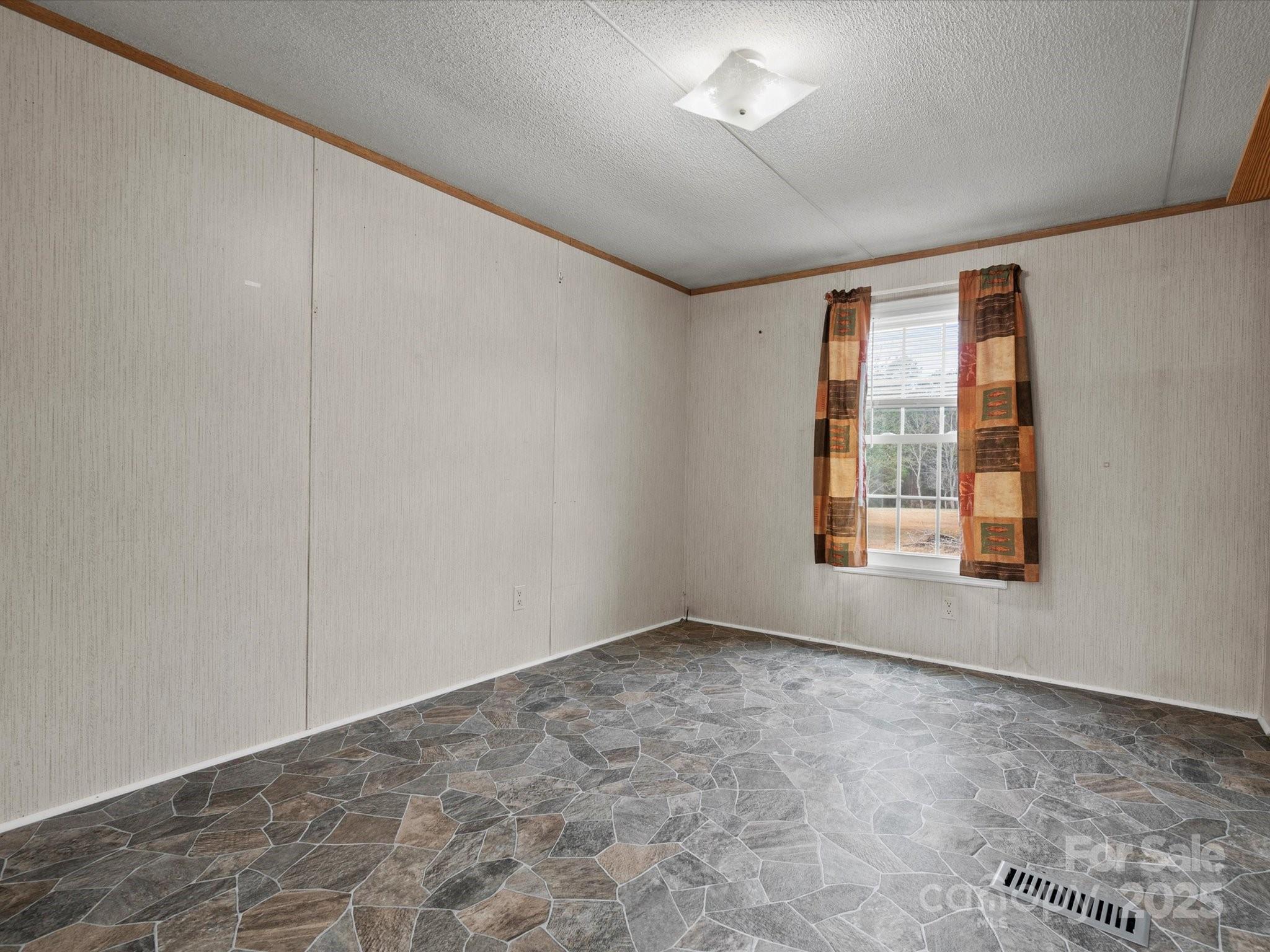 3231 Rocky Ridge Road Wallace, SC 29596 - Photo 20 of 35 an empty room with windows