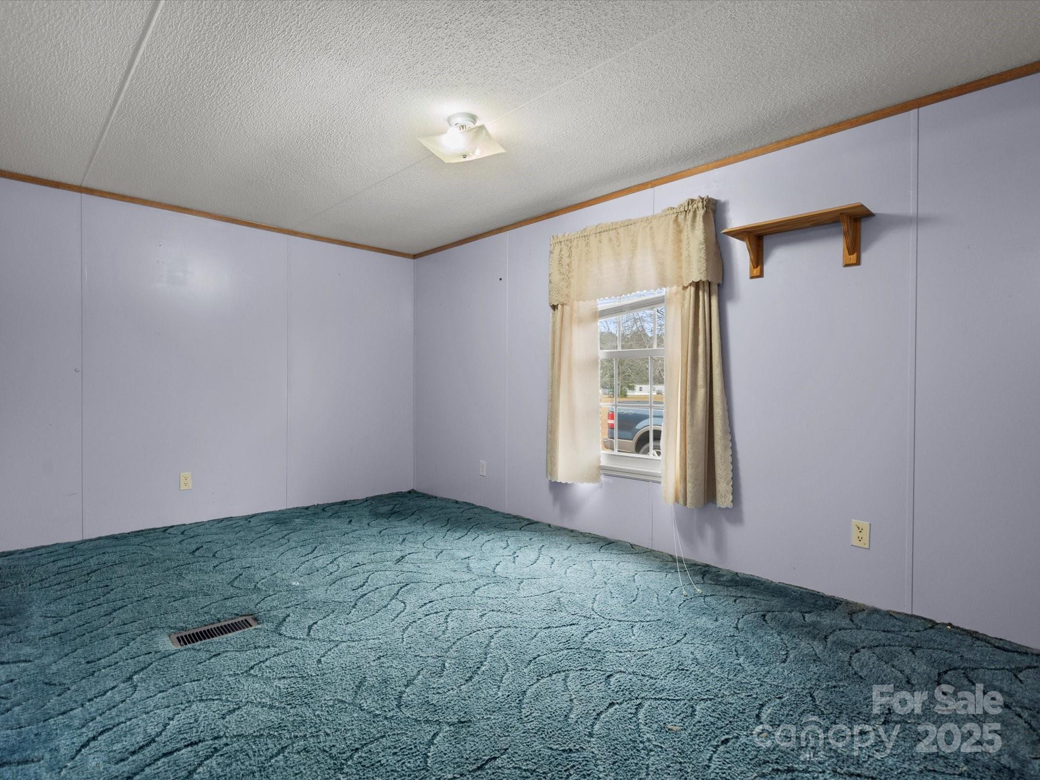 3231 Rocky Ridge Road Wallace, SC 29596 - Photo 23 of 35 an empty room with windows