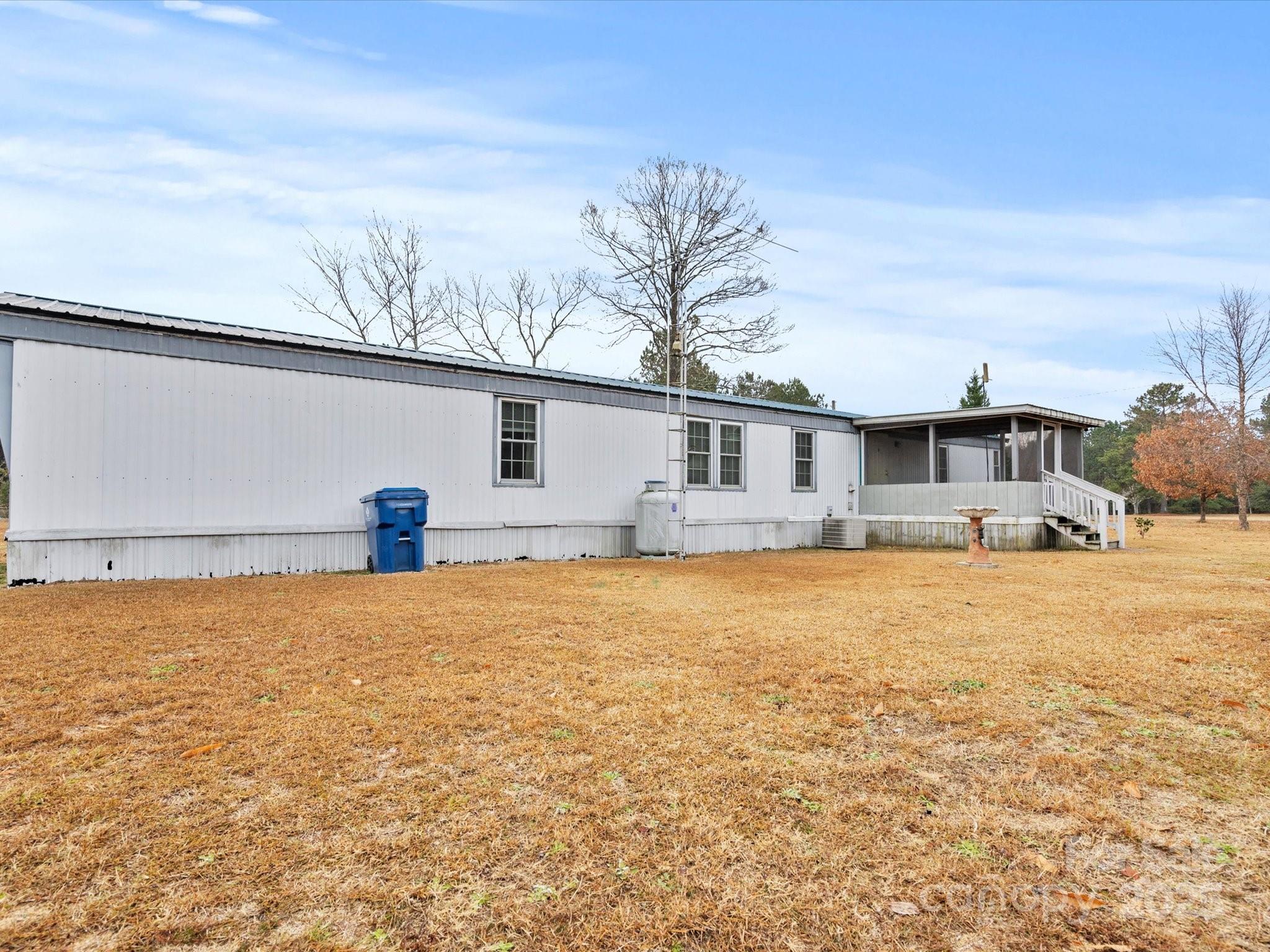 3231 Rocky Ridge Road Wallace, SC 29596 - Photo 25 of 35 a front view of a house with a yard