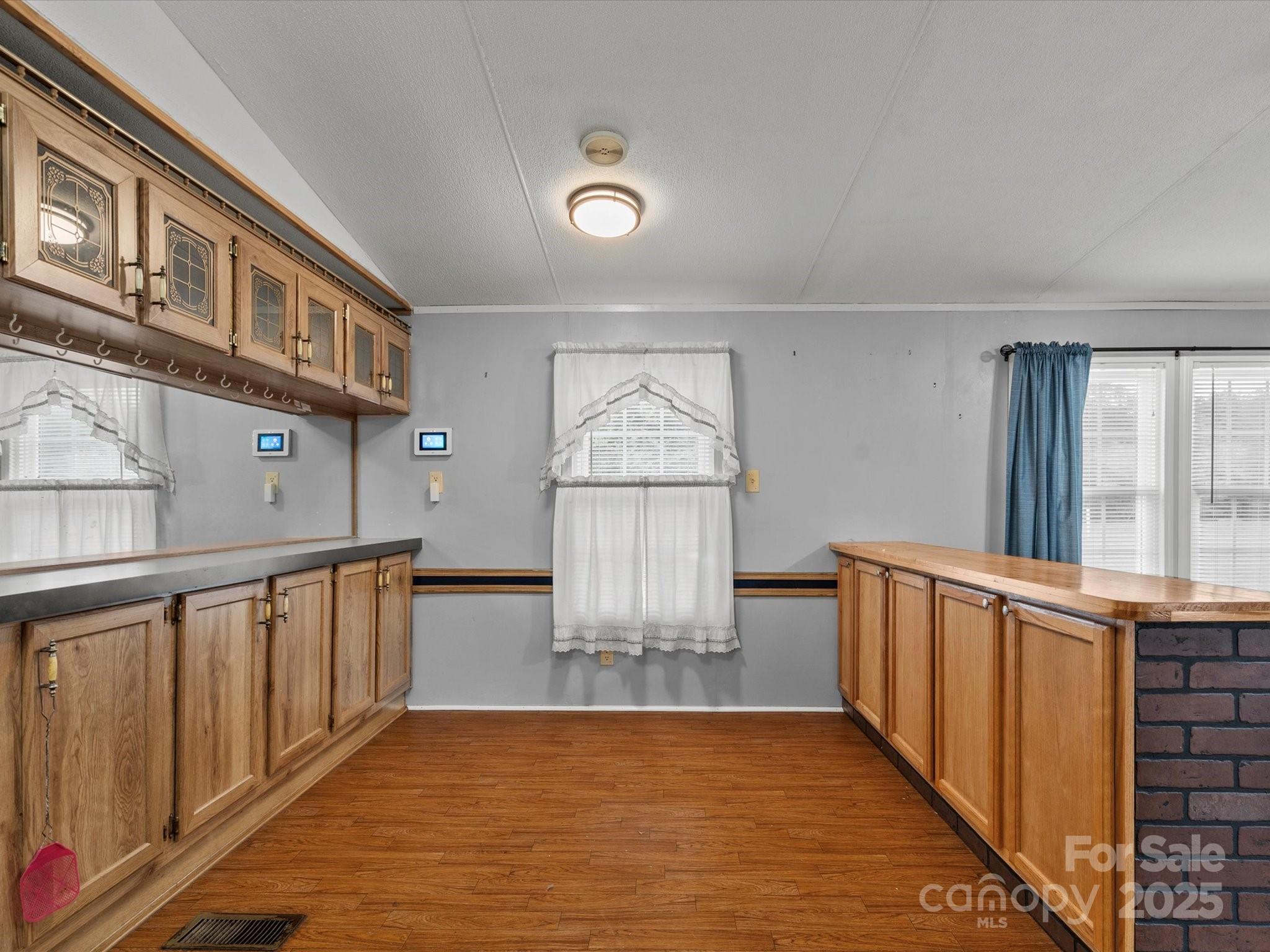 3231 Rocky Ridge Road Wallace, SC 29596 - Photo 8 of 35 a view of a hallway with wooden floor and staircase