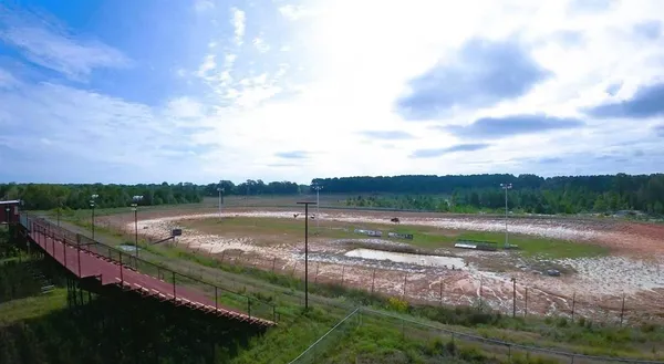 a view of a lake with a big yard