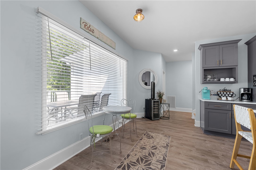 206 Petty Road Seneca, SC 29672 - Photo 10 of 47 A well-lit casual dining nook complements this inviting kitchen space.