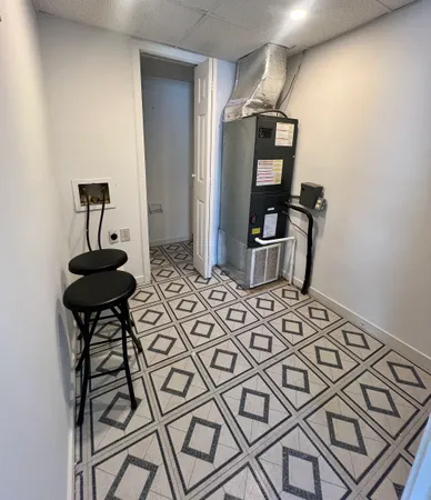 a bedroom with a bed and a mirror