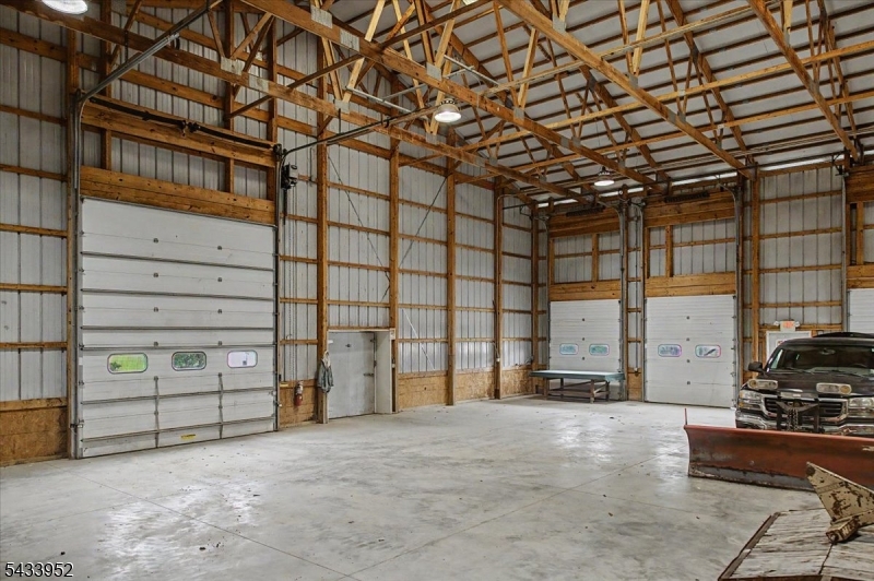 80 Valley Crest Road Annandale, NJ 08801 - Photo 9 of 42 a view of a car garage