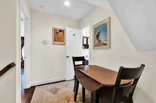 a view of a dining room with furniture
