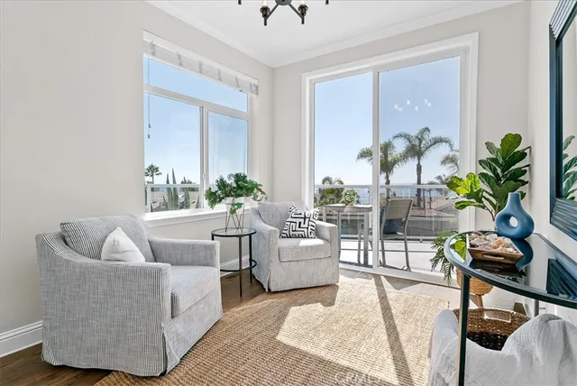 a kitchen with cabinets stainless steel appliances and a window