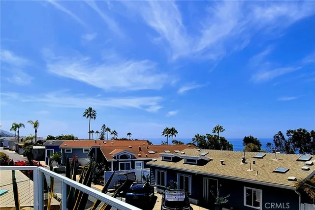 a view of balcony with furniture