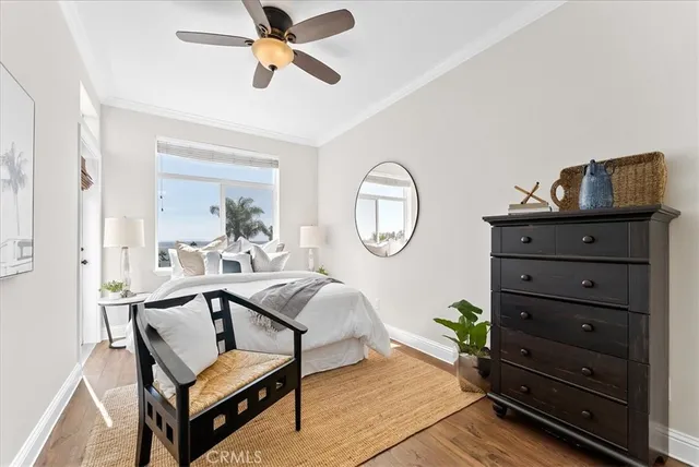a bathroom with a toilet a sink and a mirror