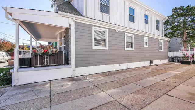 a view of a house with a street