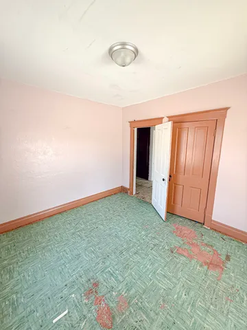 a view of empty room with windows