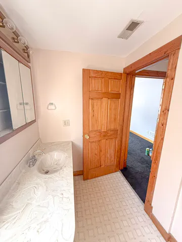 a view of staircase with large window