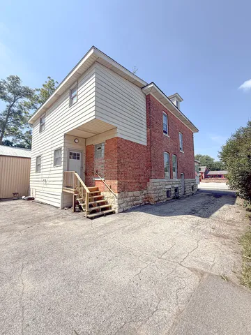 a view of a house with a patio