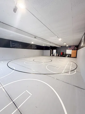 a view of a room with wooden walls