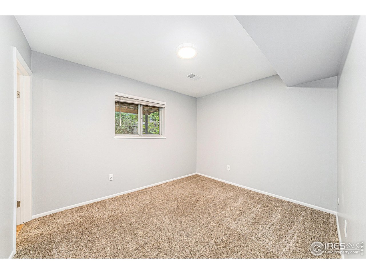 741 Kimball Road Fort Collins, CO 80521 - Photo 23 of 33 Garden Level Basement Bedroom 4 w/ 1/2 Bath