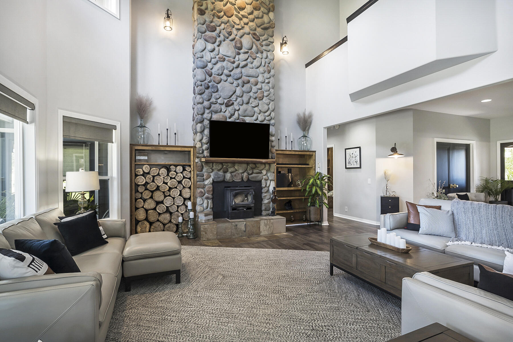 24055 Dodds Road Bend, OR 97701 - Photo 13 of 61 Soaring ceilings and river rock wood-burning fireplace.