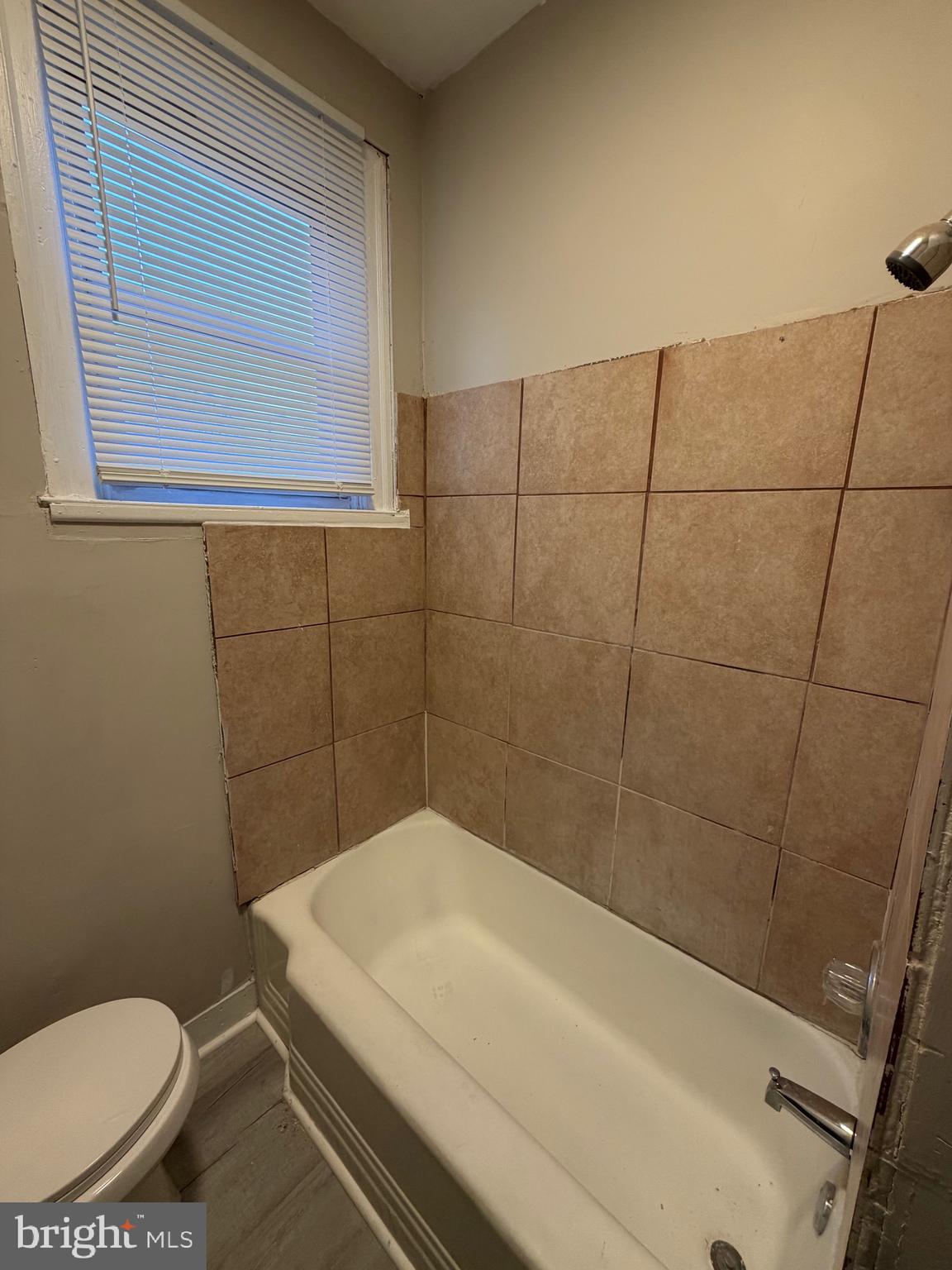 4643 Leiper Street, Unit 1 Philadelphia, PA 19124 - Photo 9 of 9 a bathroom with a sink and a toilet